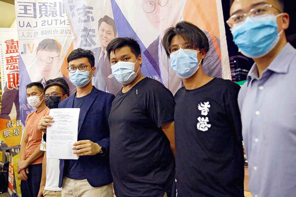 Hong Kong officially blocks 12 democrats from election